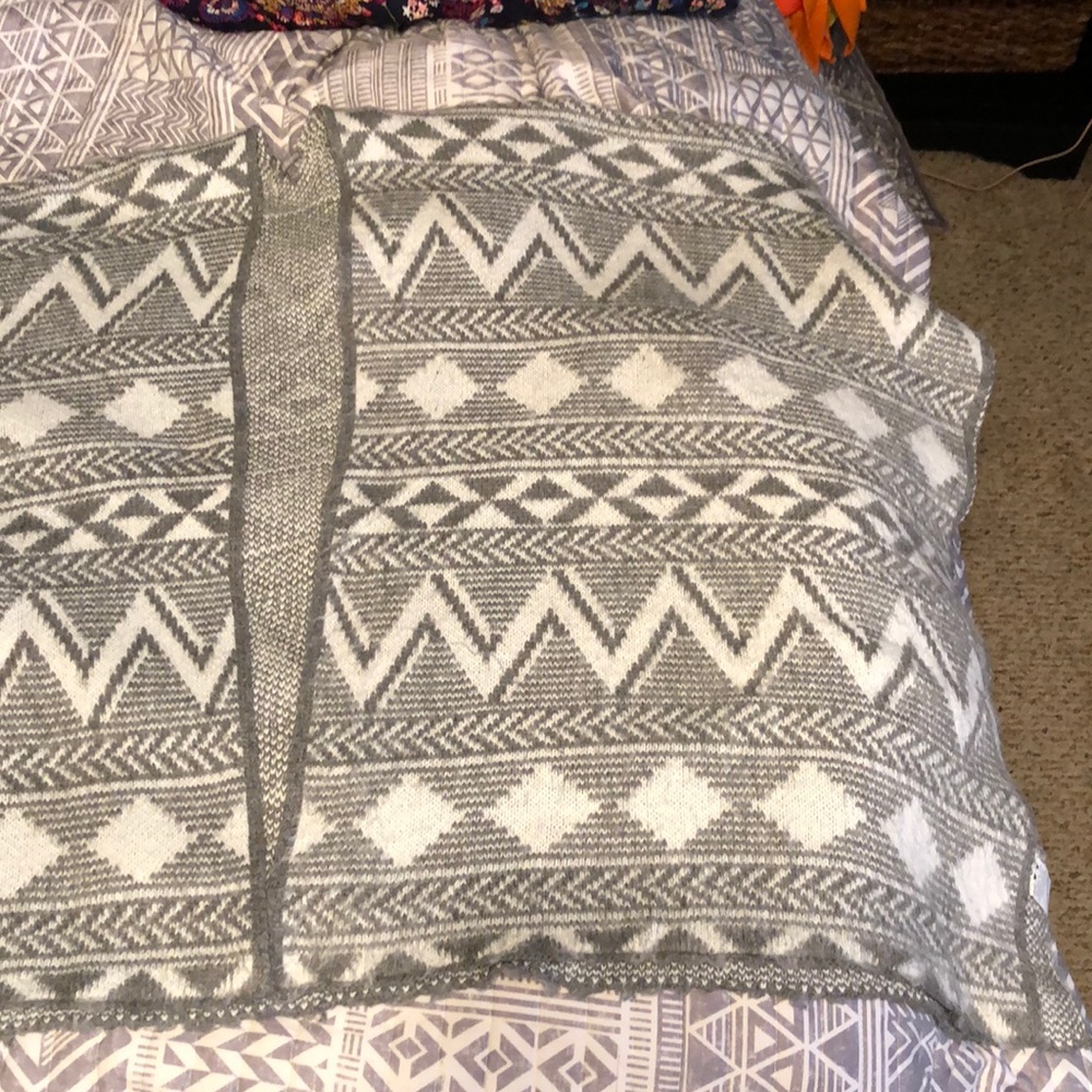 Gray and white poncho